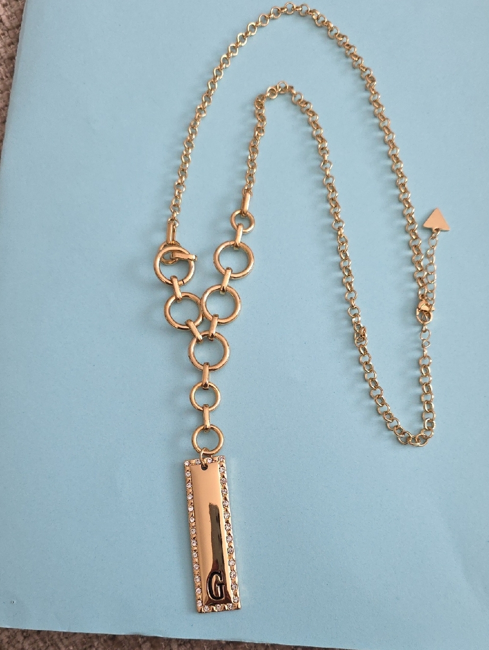 Guess Gold-Tone Bar Pendant Necklace with Crystal Trim